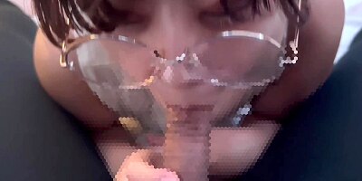 Girl with glasses doing a blowjob while making erotic sounds and getting a lot of sperm